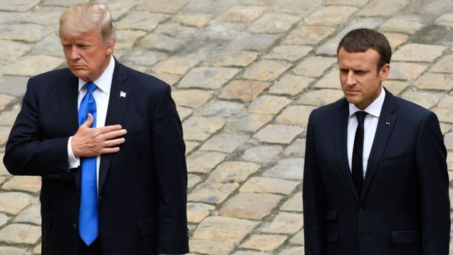 US President Donald Trump and French President Emmanuel Macron during a welcome ceremony at Les Invalides in Paris, France, 13 July 2017