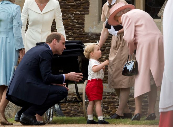 Queen Elizabeth II speaks to Prince George
