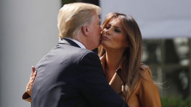 US President Donald Trump kisses First Lady Melania Trump after her speech