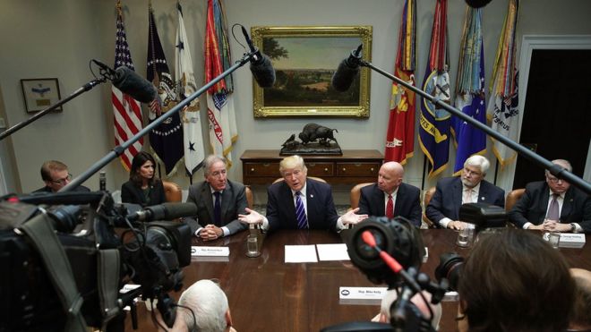 U.S. President Donald Trump (C) speaks during a meeting with members of the House Ways and Means Committee as committee chairman Rep. Kevin Brady (R-TX) (R) and ranking member Rep. Richard Neal (D-MA) (L) listen September 26, 2017 at the Roosevelt Room of the White House in Washington, DC. President Trump met with members of the committee to discuss tax reform.