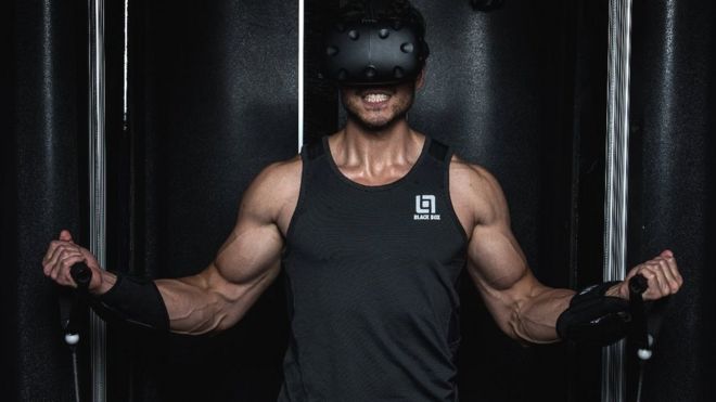 Man using VR gym kit