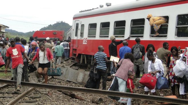 Survivors leaving a train crash site in Cameroon.