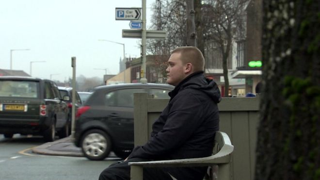 Sam, 23, sitting on bench