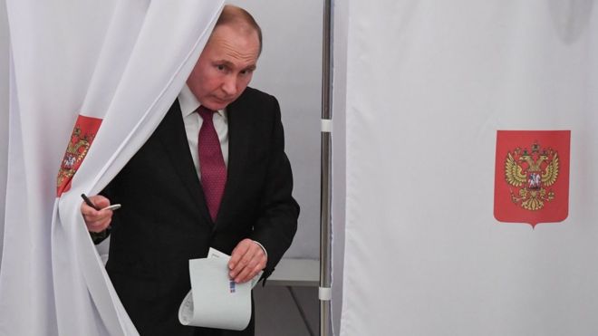 Vladimir Putin votes in Moscow, Russia, on 18 March 2018