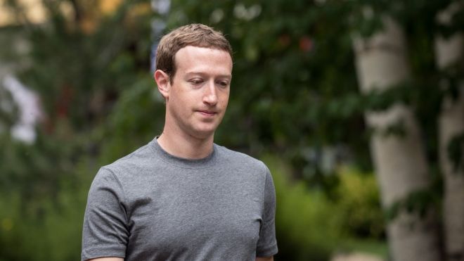 Mark Zuckerberg, chief executive officer and founder of Facebook Inc., walks in Sun Valley, Idaho where he's attending the fourth day of the annual Allen Company Sun Valley Conference, in July 2017