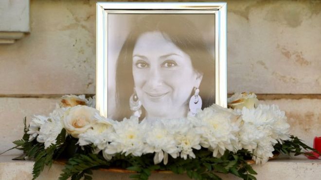 Flowers and tributes laid at the foot of the Great Siege monument in Valletta, Malta on 19 October