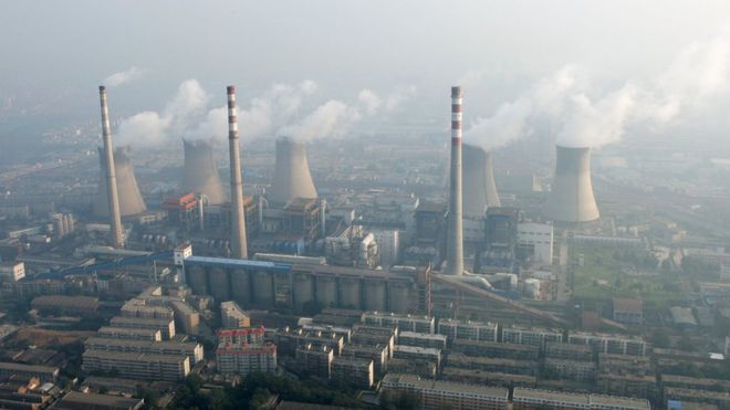 An aerial view shows a coal-burning power plant on the outskirts of Zhengzhou, Henan province, China, August 28, 2010.