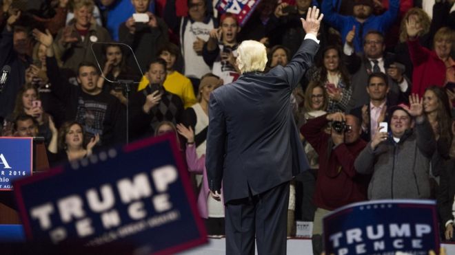 President-elect Donald Trump acknowledges the crowd after speaking at US Bank Arena on December 1, 2016 in Cincinnati, Ohio