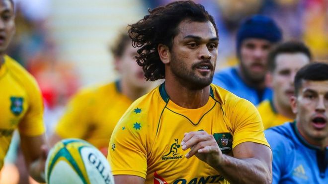 Karmichael Hunt of Australia passing the ball during international rugby match between Australia and Italy at Suncorp Stadium in Brisbane. 24 June 2017