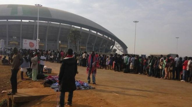 people queue to get into the Bingu stadium