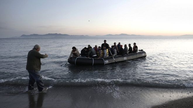 2015 file picture of refugees as they try to disembark on the coast of Kos island, Greece