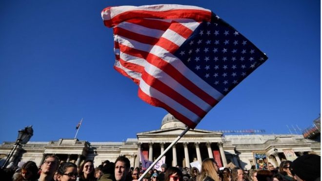 US flag being waved during Women's March in London on 21st January 2017