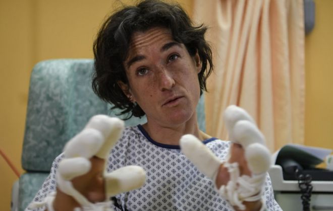 French mountaineer Elisabeth Revol talks to journalists in a French hospital