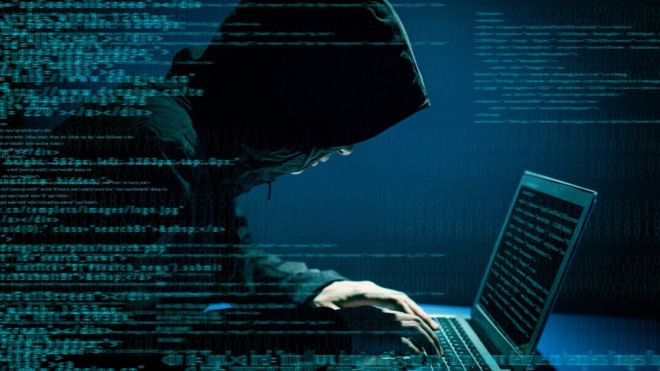 A hacker on a computer