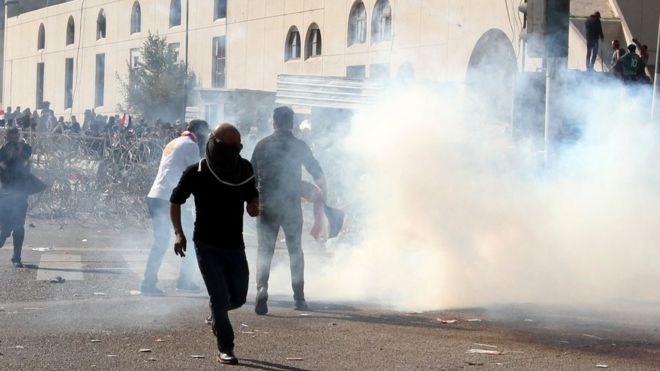 Supporters of Iraqi Shiite cleric Muqtada al-Sadr clash with Iraqi police forces following a demonstration at al-Tahrer square, central Baghdad, Iraq, 11 February 2017