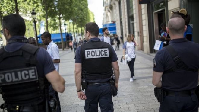 French police patrol the Champs Elysees in Paris. Photo: June 2016