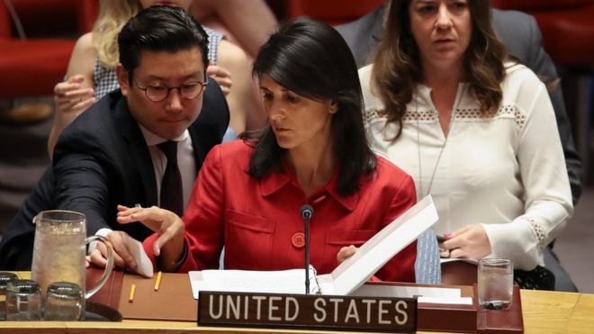 Nikki Haley, United States ambassador to the United Nations, receives a note from an aide during an emergency meeting of the U.N. Security Council at United Nations headquarters, July 5, 2017 in New York City