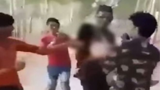 The men can be seen groping and abusing the women in the video