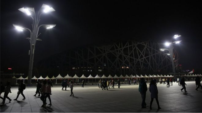 A view of the National Stadium (Bird's Nest) during Earth Hour in Beijing, China, 24 March 2018