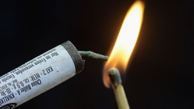 Match lighting a fuse