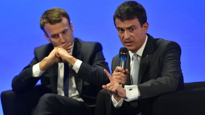 File pic 2015: French Economy and Industry minister Emmanuel Macron (L) and French Prime minister Manuel Valls in the French northern city of Boulogne-sur-Mer