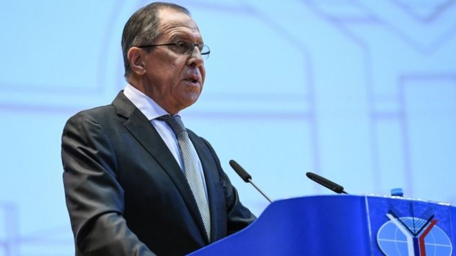 Sergei Lavrov at a podium talking