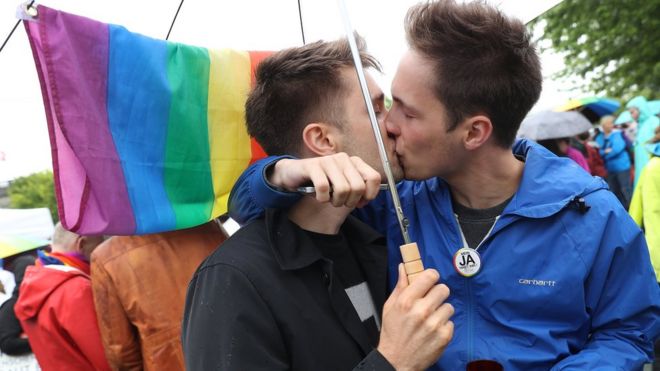 Supporters of gay rights celebrate following a vote at the nearby Bundestag in which parliamentarians approved a new law legalising gay marriage in Germany on 30 June 2017 in Berlin