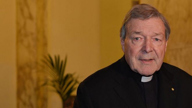 Cardinal George Pell speaks to the media in Rome last year