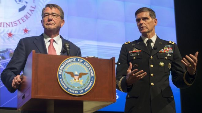 US Defence Secretary Aston Carter (L) alongside General Joseph Votel (