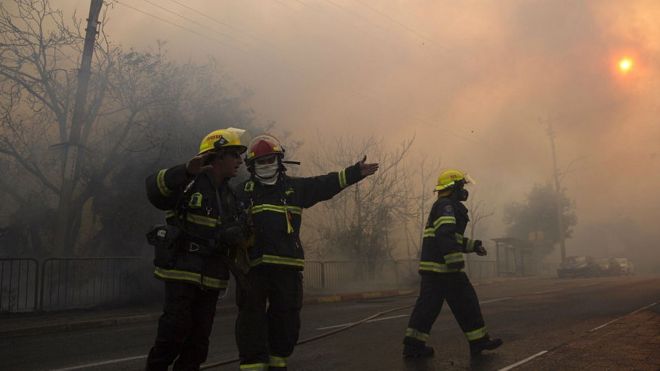 Fire fighters work in Haifa, Israel, Thursday, Nov 24, 2016