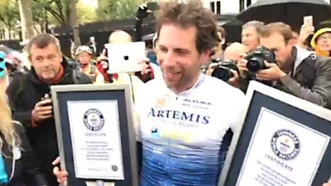 Mark Beaumont with Guinness World record certificates