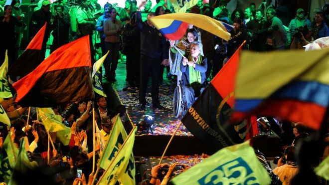 Ecuadorean presidential candidate Lenin Moreno (C) and supporters celebrate in a hotel in Quito, Ecuador, April 2, 2017