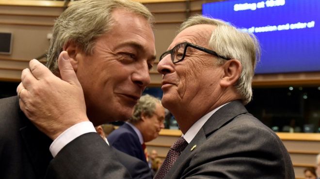 European Commission President Jean-Claude Juncker welcomes Nigel Farage at the European Parliament