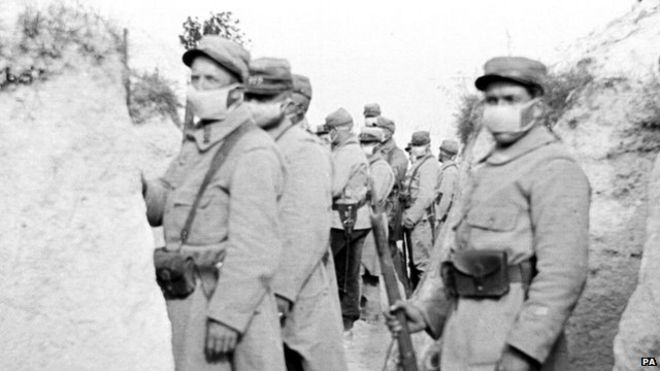 French troops wearing the primitive veil respirators