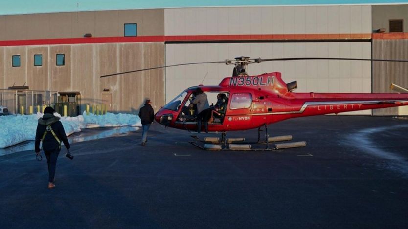 Photographer Eric Adams took a photo of the helicopter tour boarding their flight before the East River crash