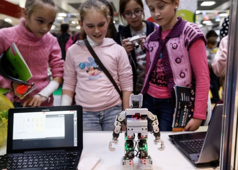 Girls at a science fair in Russia