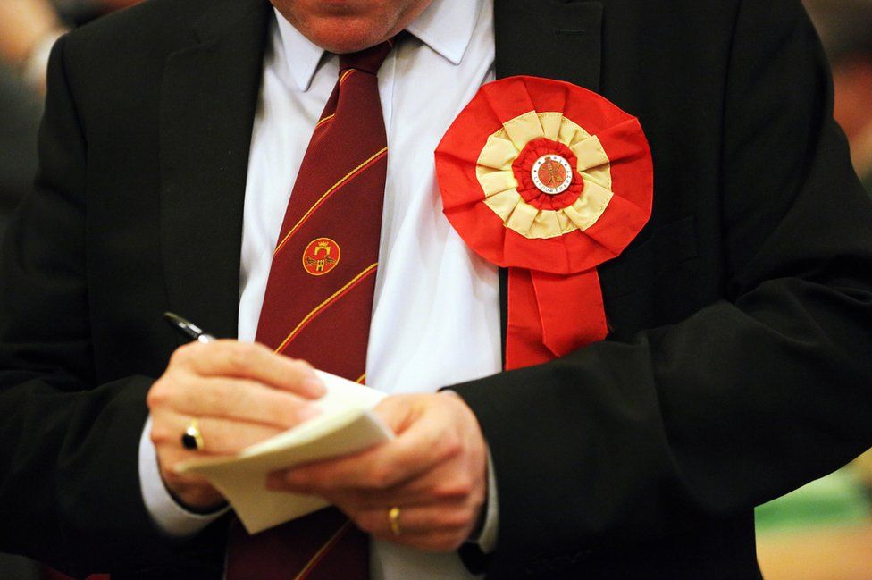 A Labour party representative takes notes of the counting of the ballots UK General Election, polling day, results, Swansea, Wales