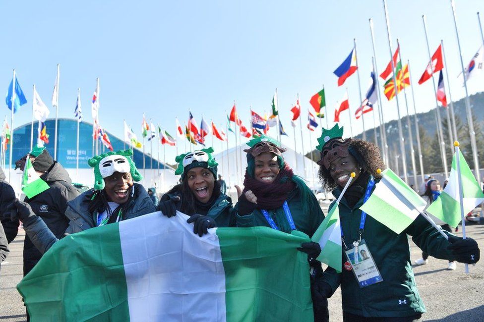 Nigeria's women's bobsleigh and skeleton team members Seun Adigun, Ngozi Onwumere, Akuoma Omeoga and Simidele Adeagbo attend a welcoming ceremony for the team in the Olympic Village in Pyeongchang ahead of the Pyeongchang 2018 Winter Olympic Games on February 6, 2018.