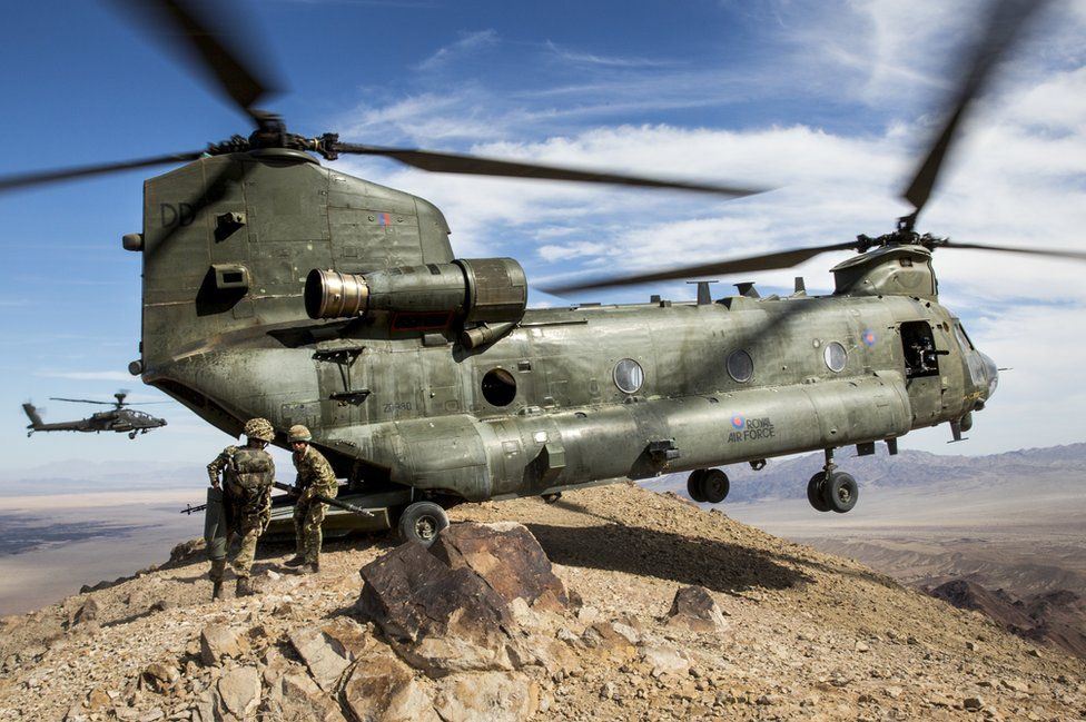 A Royal Air Force Chinook, from RAF Odiham, drops troops from 40 Commando Royal Marines onto a mountain peak in the Mojave desert during Exercise Black Alligator