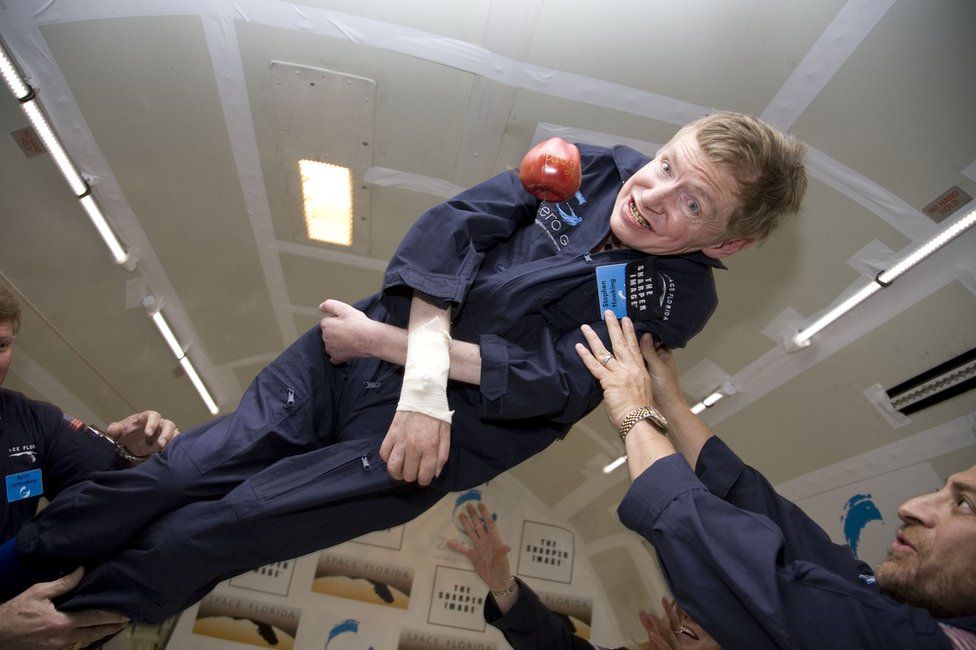 Stephen Hawking floats as he experiences zero gravity
