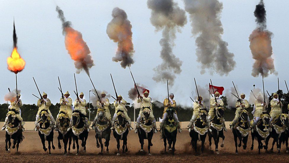 Traditional Moroccan knights fire in an equestrian show during the Festival of Tbourida, a competition between the Moroccan tribes, in Al-Jadidah, Morocco, 18 October 2017. Tbourida is a traditional exhibition of horsemanship in the Maghreb performed during cultural festivals and to close Maghrebi wedding celebrations. The performance consists of a group of horse riders, all wearing traditional clothes, who charge along a straight path at the same speed so as to form a line, the pickup speed and then at the end of the charge, fire into the sky using old muskets or muzzle-loading rifles.