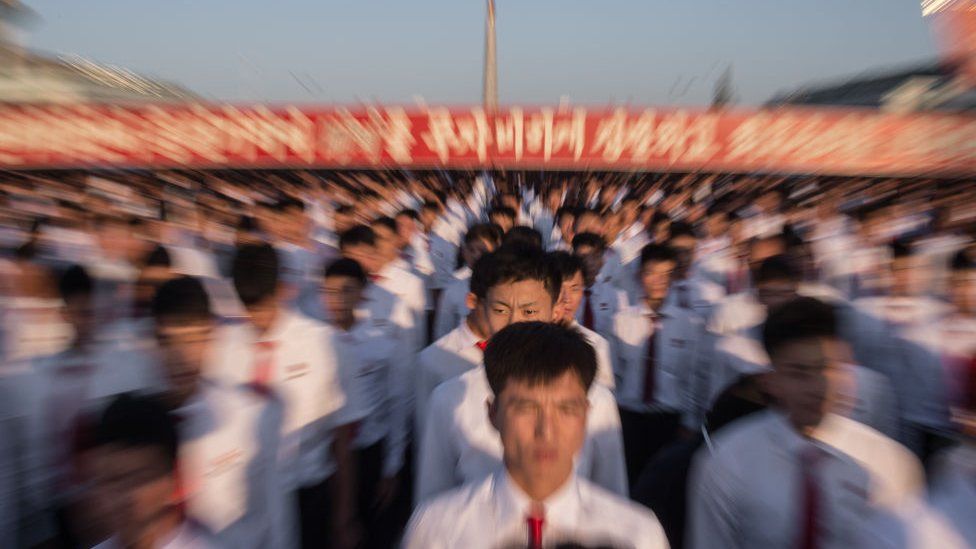 Students attend a mass rally on Kim Il-Sung sqaure in Pyongyang on September 23, 2017. Tens of thousands of Pyongyang residents were gathered in the capital's Kim Il-Sung sqaure to laud leader Kim Jong-Un's denounciation of US President Donald Trump.