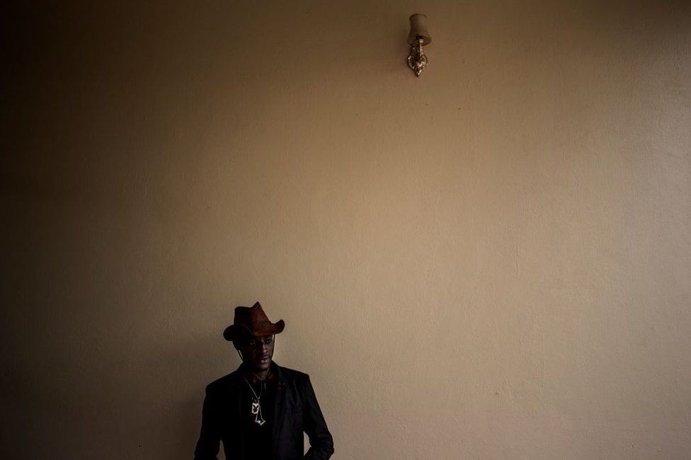 A young man is seen ahead of a welcoming ceremony for first year students on February 3, 2018 in Beni...
