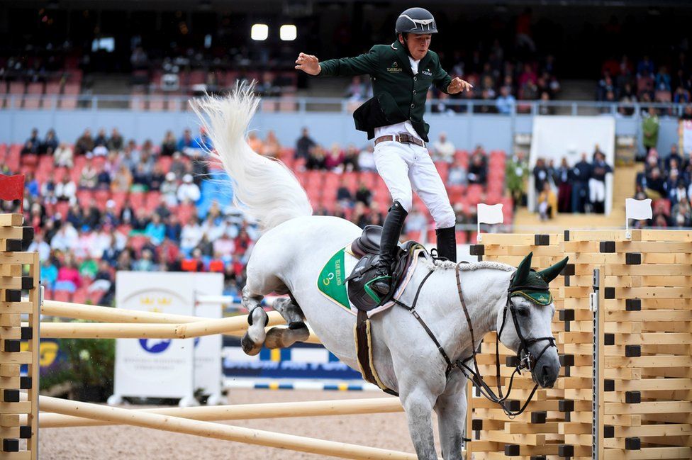 Bertram Allen of Ireland falls from his horse