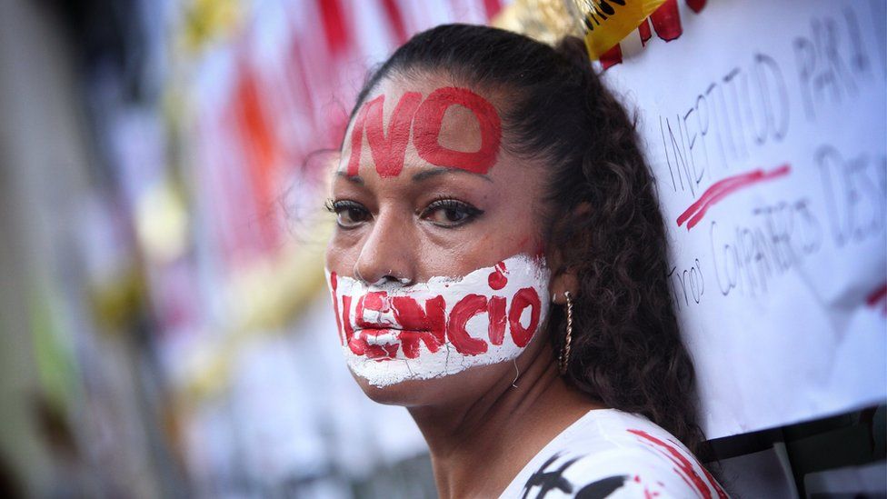 A person participates in a journalists" protest for justice in recent attacks on journalists in Mexico City, Mexico, 15 June 2017