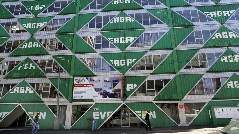 Cost effective container flats are stacked on top of each other in the Maboneng district of downtown Johannesburg, South Africa, 16 October 2017. There are 100 apartments in the building and 3 retail spaces that use the shipping containers as a base