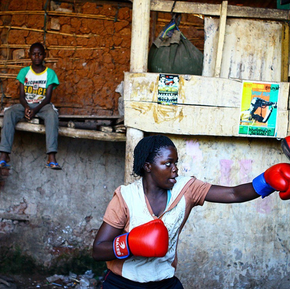 A female boxer training in Uganda