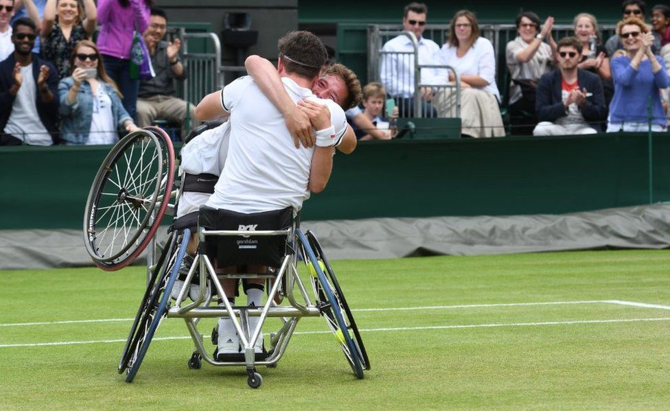 Alfie Hewett and Gordon Reid celebrate winning the final of the men's wheelchair doubles at Wimbledon 2016