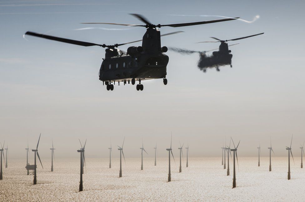 Two RAF Chinooks head out over North Sea wind farms