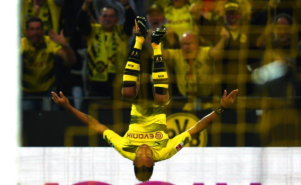 Dortmund's Gabonese striker Pierre-Emerick Aubameyang celebrates after scoring 1:0 during the German first division Bundesliga football match Borussia Dortmund vs RB Leipzig in Dortmund, western Germany, on October 14, 2017